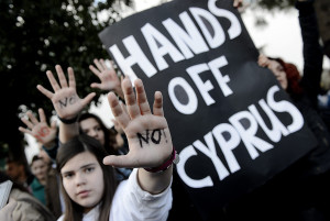 Cyprus parliament postpones vote on tax