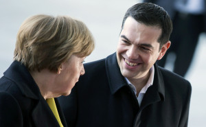 German Chancellor Angela Merkel and Greek Prime Minister Alexis Tsipras review an honour guard during a welcoming ceremony at the Chancellery in Berlin March 23, 2015. Tsipras is meeting Merkel on Monday evening, his first official visit, to discuss Greece's bailout and reform.        REUTERS/Hannibal Hanschke